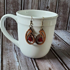 Laser Cut Dangling Swirly Heart Earrings