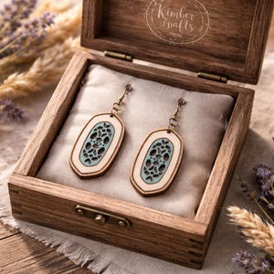 Aztec Design pierced earrings, hand-painted blue and white.