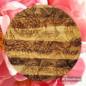 Laser engraved acacia hot plate or trivet with beautiful peonies.