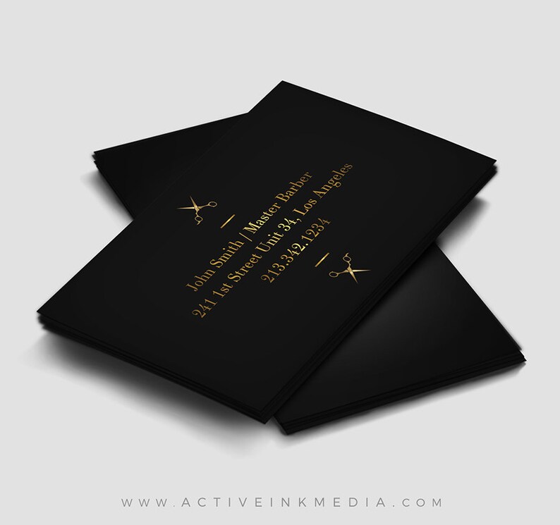 May include: Black business card with gold text and a pair of scissors icon. The text reads "John Smith/Master Barber", "241 1st Street Unit 34, Los Angeles", and "213.342.1234".