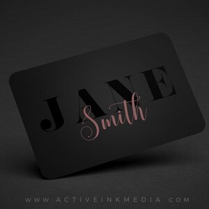 May include: Black business card with the name "JANE Smith" in white and pink lettering. The website "www.activeinkmedia.com" is printed at the bottom.