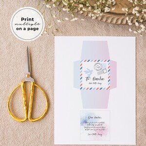 May include: Printable envelope template with a blue and pink watercolor background. The envelope is addressed to Frankie with a bunny rabbit illustration and the text "To Frankie from Tuff Fury". The text "Dear Frankie, Thank you for such a wonderful Tufft day!  I hope you are enjoying dressing up and adore all the fun you've had! Love, Tuff Fury" is printed on a separate card.