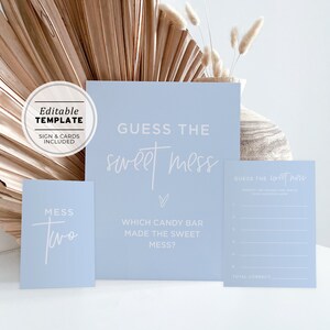 May include: A blue printable sign with the text "Guess the sweet mess" and a heart.  The sign is for a game where guests guess which candy bar made the sweet mess.  There are also two smaller blue cards with the text "Mess Two" and "Guess the sweet mess".