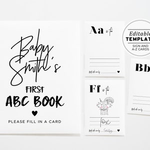 May include: A black and white sign with the text "Baby Smith's First ABC Book" and "Please fill in a card". There are also smaller cards with the letters "A", "B", and "F" and a fox illustration.