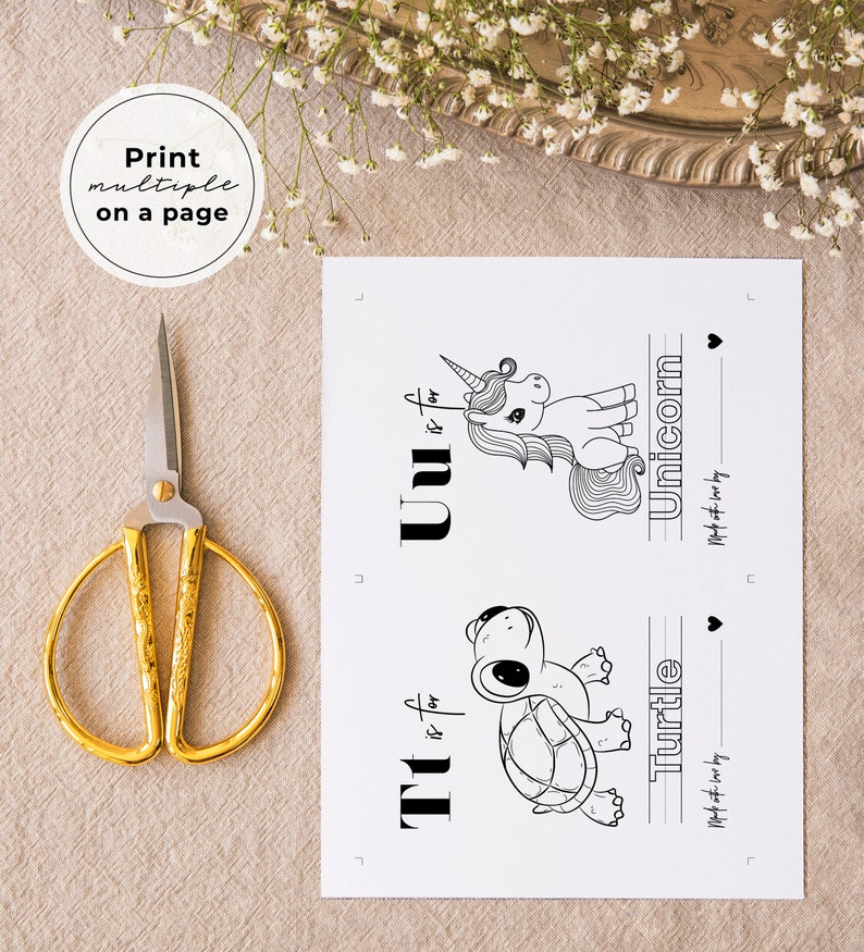May include: Black and white printable alphabet flash cards featuring a unicorn and a turtle. The cards include the letters "U" and "T" and the words "Unicorn" and "Turtle".