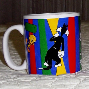 Taza de cerámica de dibujos animados Vintage Warner Brothers, 1995 - Bugs Bunny, Tweetie Bird & Sylvester The Cat, y The Taz Devil - Taza vintage sin usar