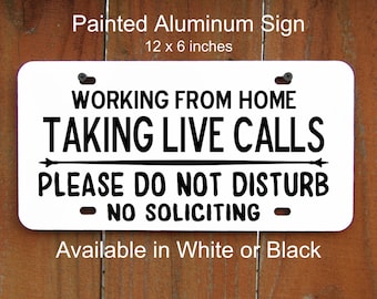 May include: White metal sign with black text that reads "Working from home taking live calls please do not disturb - no soliciting -"  The sign is 12 inches by 6 inches.