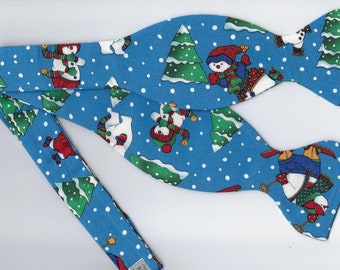 Christmas Bow Tie | Snow Skiing Snowmen on Blue | Self-tie or Pre-tied | Christmas Party | Bow ties for Men | Boys bow tie | Girls Hair Bow