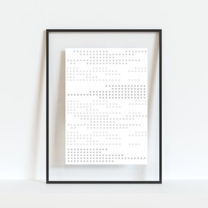 May include: A black framed poster with a white background and a pattern of small grey squares.