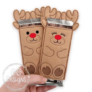 May include: Two brown felt reindeer gift bags with red noses and embroidered eyes. The bags are designed to hold chocolate bars.