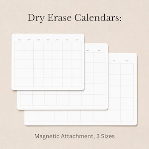 May include: Three white dry erase calendars with a grid layout and printed days of the week. The text Dry Erase Calendars: and Magnetic Attachment, 3 Sizes is visible. Each calendar features a clean white surface with thin gray grid lines.