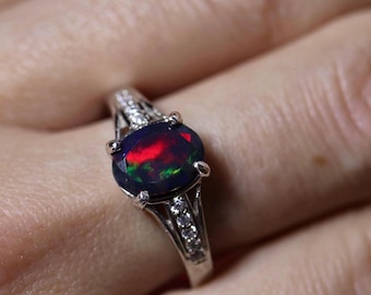 Black fire opal engagement ring in minimalist silver gemstone ring with a genuine black fire opal with red fire, unique wedding ring opal