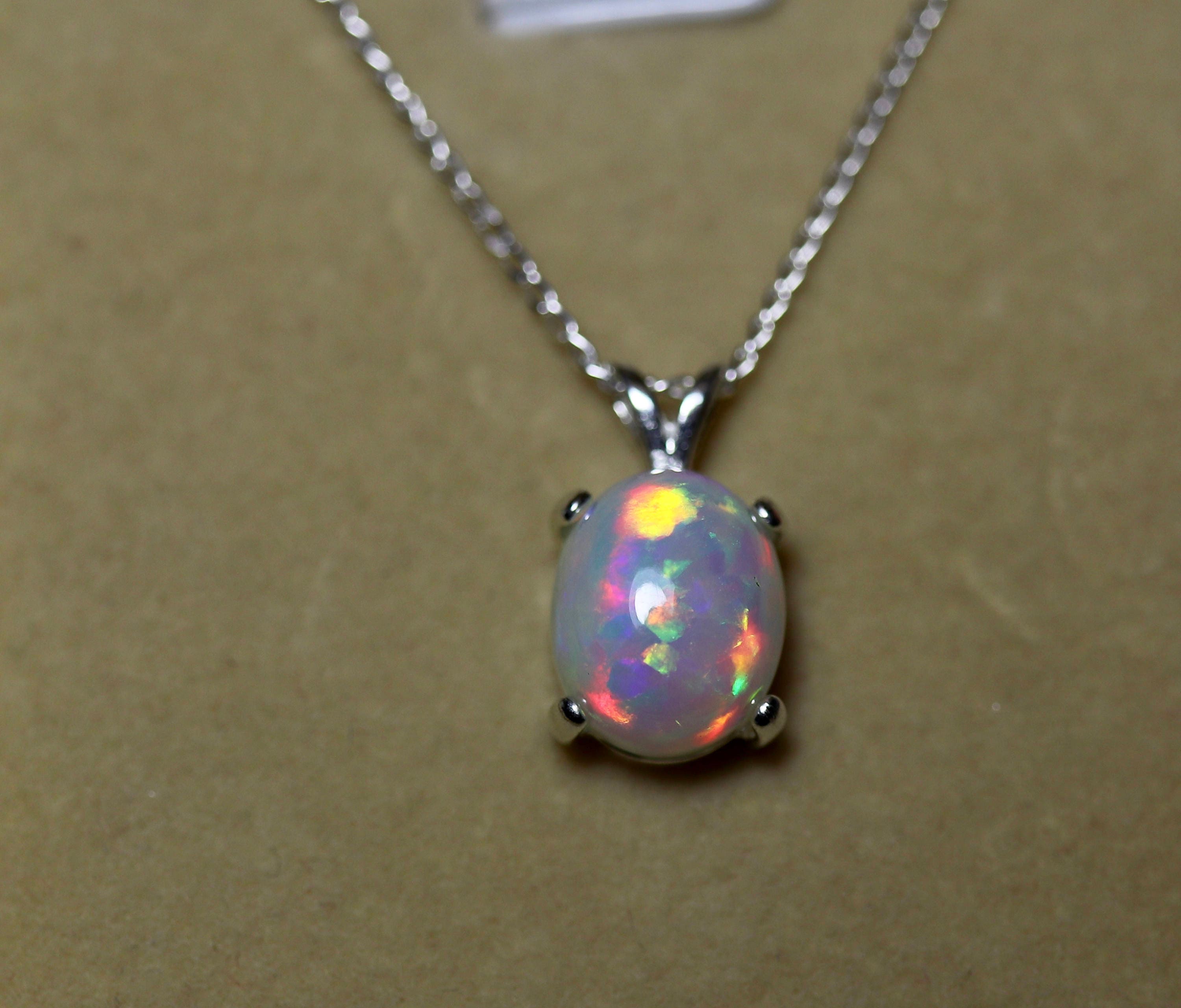 RARE quality grade large natural opal pendant, AAAA rainbow glowing ...