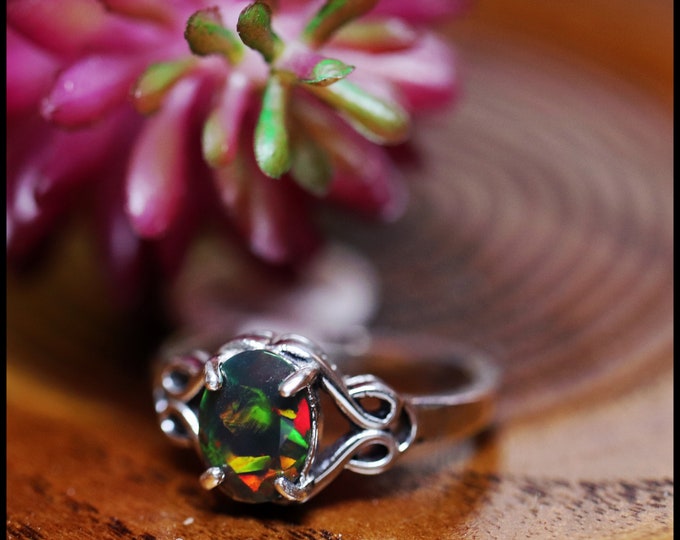 Celtic knot unique vintage ring made with sterling silver with a natural black fire opal that has rare bright play of color