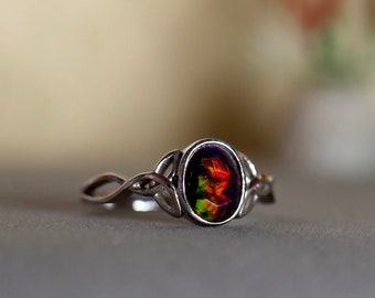 Black Opal Silver Ring Handcrafted in Celtic style with a genuine black opal gemstone and delicate 14k white gold filled Celtic knot band