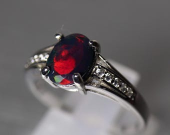 Black fire opal engagement ring in minimalist silver gemstone ring with a genuine black fire opal with red fire, unique wedding ring opal