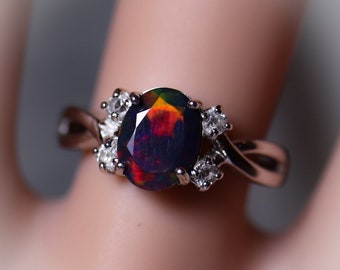 Natural black fire opal engagement ring made w white topaz accent stones on both sides and a fabulous rare 8x6mm black opal