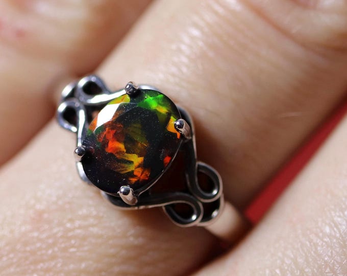 Celtic knot silver engagement ring featuring a genuine black fire opal stone with red play of color - natural opal ring tarnish resistant