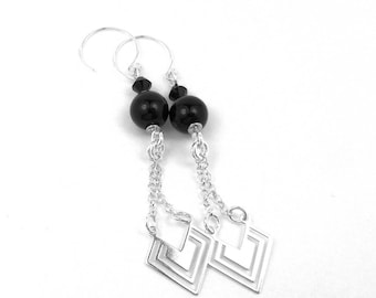 Silver earrings with black onyx beads and Swarovski crystal graphics