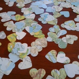 200 paper hearts hand punched from vintage atlas pages maps for confetti bon voyage wedding or use in art craft collage cards scrapbooks