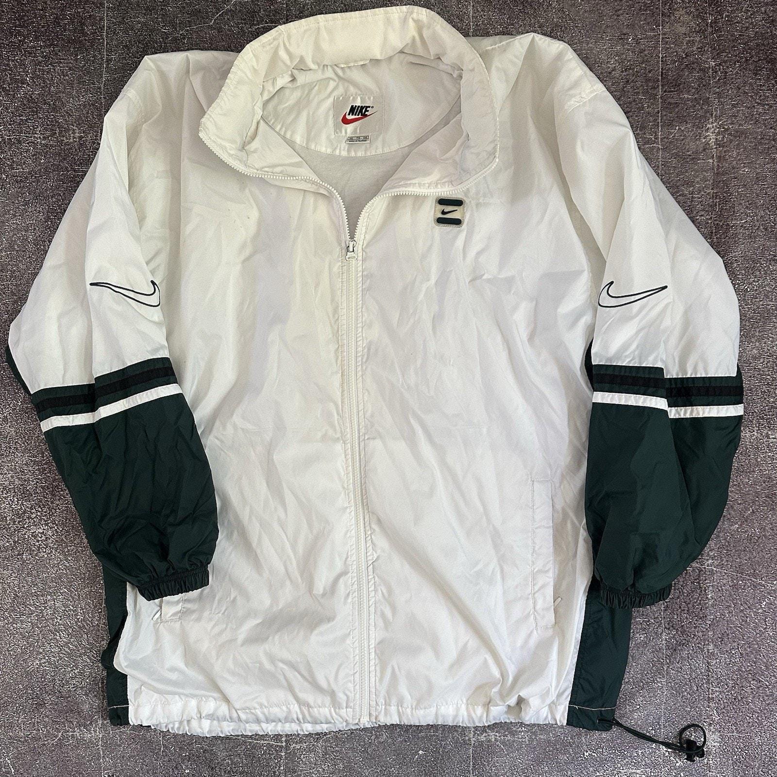 vintage nike forest green spell out windbreaker