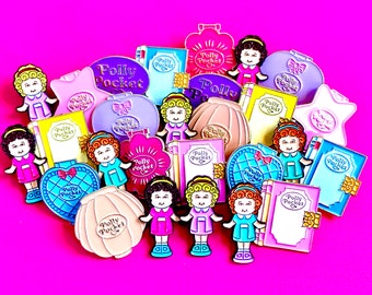May include: A collection of vintage Polly Pocket toys in various shapes and colors, including compacts, figures, and accessories. The toys feature the Polly Pocket logo and are set against a vibrant pink background.