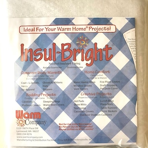 May include: A white package with a blue and white patterned design. The package contains Insul-Bright Needled Insulated Lining. The package features the text "Ideal For Your Warm Home® Projects!" and "Insul-Bright". The package lists various uses for the product, including "Conserve Body Warmth", "Home Comfort", "Bedding Projects", and "Creative Projects".
