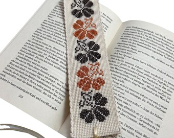 Embroidered bookmark with flowers in brown tones