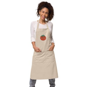 Funny Tomato Smirk Organic Cotton Apron – Cute Veggie Cooking Gift for Foodies, Gardeners, Chefs – Humorous Kitchen Apron w/ Smiling Tomato
