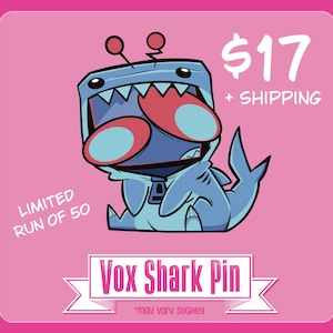 Op de afbeelding: Een vierkante afbeelding met een stripfiguur in een blauw haaienpak met een wijd open mond, scherpe tanden en twee grote rode ogen. Het ontwerp bevat de tekst Vox Shark Pin en de vermelding limited run of 50 op een roze achtergrond.