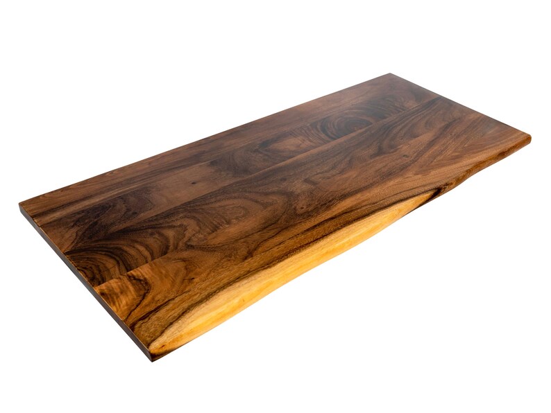 Standing desk wood top made from solid walnut with a natural live edge and an eco-friendly finish, combining durability with eco-conscious craftsmanship.