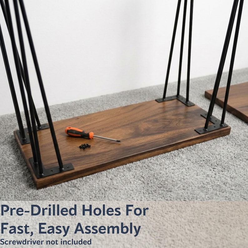 May include: A partially assembled wooden side table with black metal hairpin legs. The tabletop is a rich brown color, and an orange and black screwdriver rests on the surface. The text "Pre-Drilled Holes For Fast, Easy Assembly" is visible.