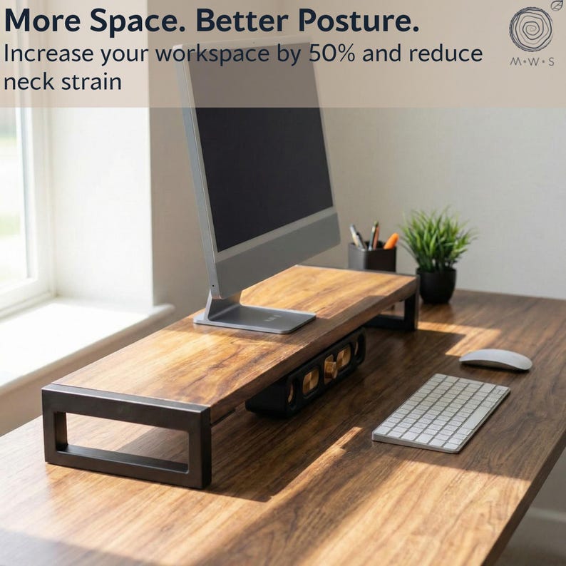 May include: Walnut monitor stand on a solid wood desk, designed to increase workspace space, improve monitor height, and support better posture in a modern office setup.