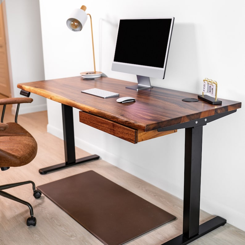 Walnut desk with storage, featuring durable walnut hardwood and live edge. Equipped with black dual motor legs for seamless height adjustment, making it a perfect standing table with drawers or a live edge stand-up desk for your workspaces.