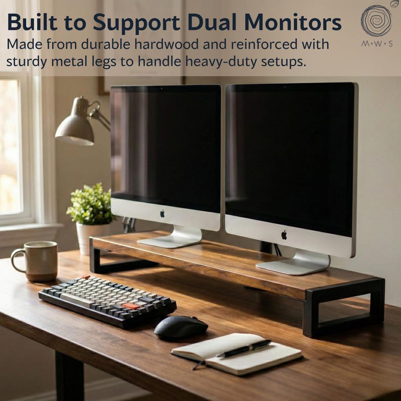 May include: Walnut monitor stand supporting dual monitors on a solid wood desk, made with durable hardwood and sturdy black metal legs for heavy-duty office setups.