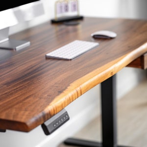 Walnut solid wood desk featuring a live edge, smooth and durable finish, with options for 2 leg colors and sizes. Perfect as stylish and functional office furniture, it brings the warmth and natural beauty of walnut wood furniture to any workspace