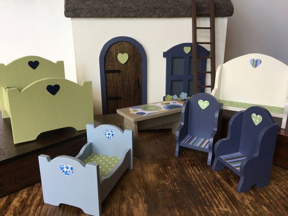 wooden dollhouse furniture and dolls