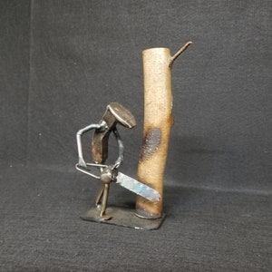 Lumberjack | Metal Art | Lumberjack figurine | Railroad spike art | Metal Art chainsaw |