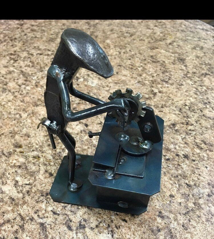 Carpenter - Skilled Craftsman Railroad Spike Sculpture
