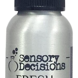 May include: A silver spray bottle with a black cap and clear plastic top. The bottle has the words "Sensory Decisions FRESH COFFEE" printed on it. The website SensoryDecisions.com is printed at the bottom.