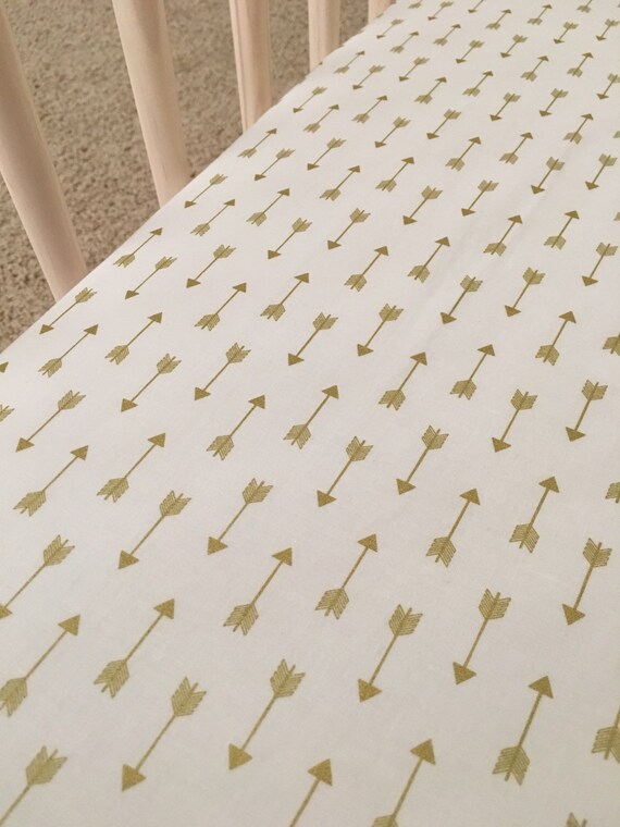 white and gold crib sheet