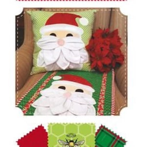 May include: A festive Christmas-themed image featuring a pillow and table runner with Santa Claus designs. The Santa faces have white petal-like beards and red hats. The image also includes red poinsettias and fabric squares with text.