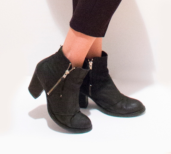 black leather ankle boots with zip