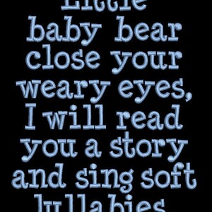 May include: A blue embroidered design on a black background with the text "Little baby bear close your weary eyes, I will read you a story and sing soft lullabies."
