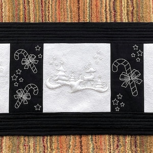 in the hoop Trapunto christmas themed table runner machine embroidery design ith quilting bauble reindeer tree