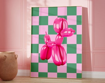 May include: A framed artwork featuring a pink balloon dog against a green and pink checkered background. The artwork is displayed in a pink room with a wooden cabinet and a large terracotta vase.
