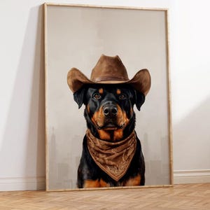 May include: A black and tan Rottweiler dog wearing a brown cowboy hat and a brown bandana with a paisley pattern. The dog is looking directly at the camera.