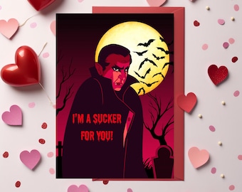 May include: A Valentine's Day card featuring a cartoon vampire with the text "I'm a sucker for you!" The vampire is standing in front of a full moon and a graveyard.
