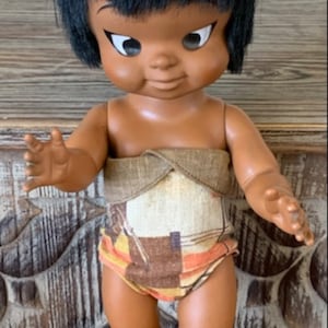 mowgli baby doll