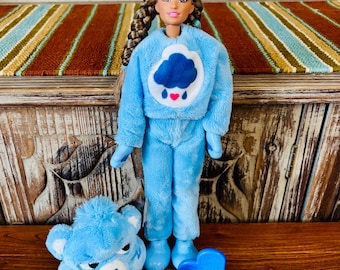 Barbie Doll with Reversable Carebear Grumpy Bear Head Costume/Pajamas with Mini Grumpy Bear Figure and Comb